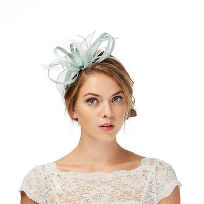 Pale green feather fascinator